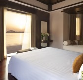 53151276-H1-Two_Bed_Beach_Villa_Bedroom_Sunset