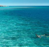 VAKKARU MALDIVES - snorkelling-near-over-water-villas